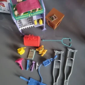 Barbie bundle with ambulance, dentist, and baby doctor sets