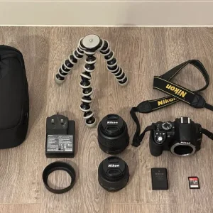 Nikon D3100 with 18-55mm and 35mm lens, tripod, bag - Image 2