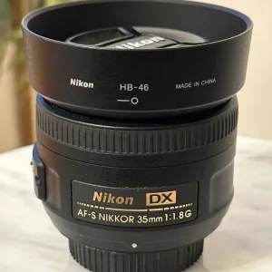 Nikon D3100 with 18-55mm and 35mm lens, tripod, bag - Image 4