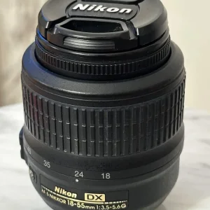 Nikon D3100 with 18-55mm and 35mm lens, tripod, bag - Image 5