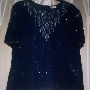 size 22 navy blue sparkly top with bead details