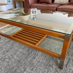 Two oak framed glass topped coffee tables