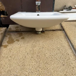 Bathroom sink with tap