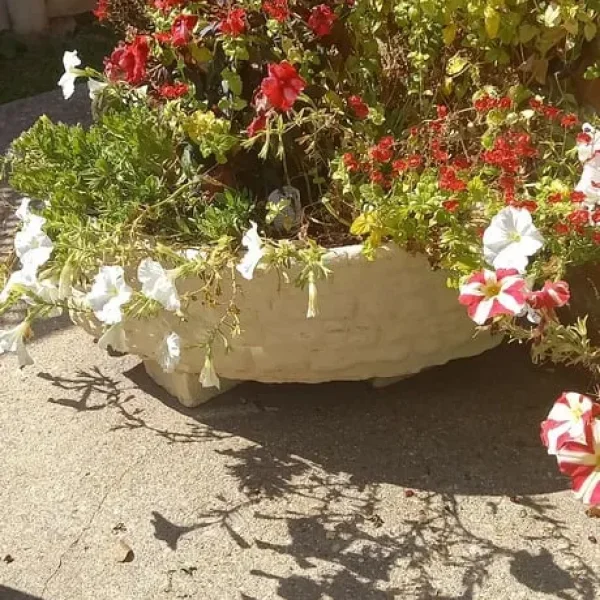 Assortment of concrete garden ornaments