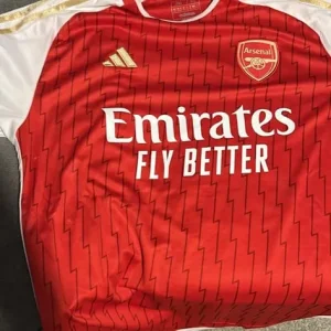 Arsenal football tops both - Image 4