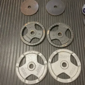 Various Olympic plates, equipment and matting