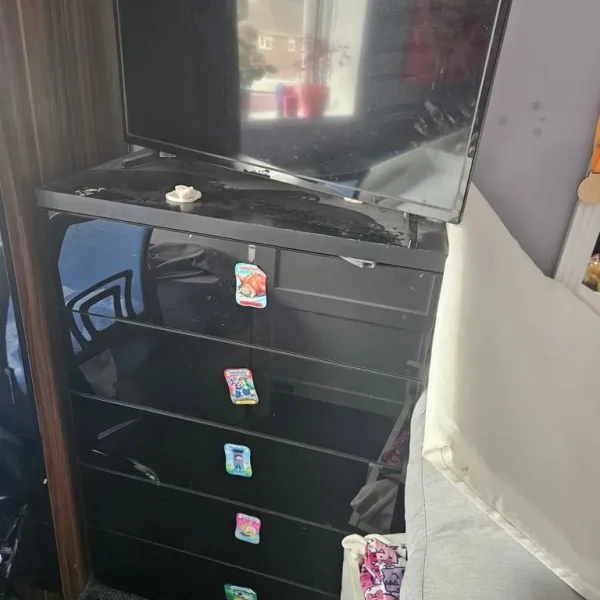 Gloss black wardrobe and chest of draws