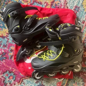 Men’s Rollerblades black size UK 13 with knee wrist and elbow pads