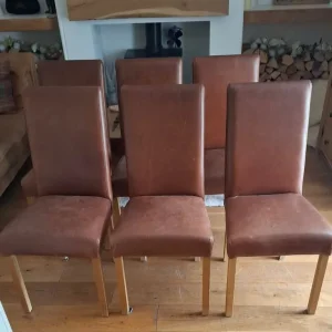 Indigo dining table and six oak leather chairs