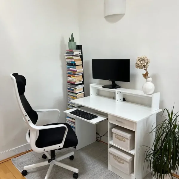 White ergonomic office chair with mesh back and lumbar support