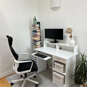 White ergonomic office chair with mesh back and lumbar support