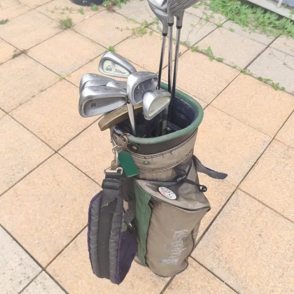 Golf set with Titleist, Wilson, and Black Knight clubs