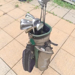 Golf set with Titleist, Wilson, and Black Knight clubs
