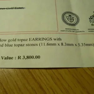 heavy casing on these large 7.1 grams 14ct gold blue topaz earrings + papers - Image 4