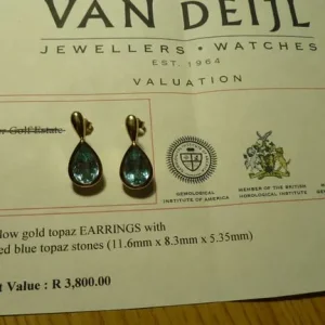 heavy casing on these large 7.1 grams 14ct gold blue topaz earrings + papers