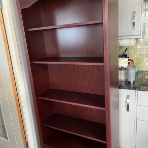 Large brown bookcase with two drawers