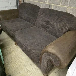 Brown Chesterfield sofa and chair