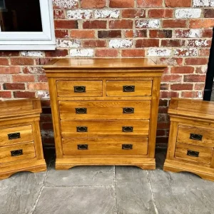 Matching Solid Oak Chest of Drawers and Pair of Bedside Tables