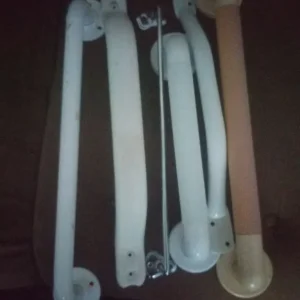 5 hand rails and a towel rail