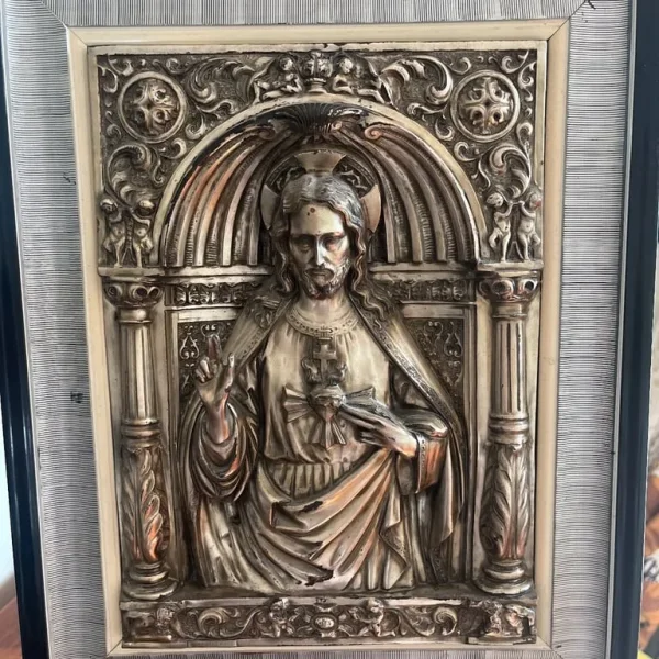 Repousse copper Jesus with silver plate