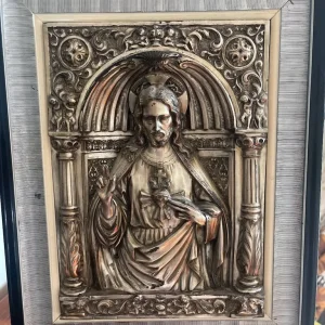 Repousse copper Jesus with silver plate
