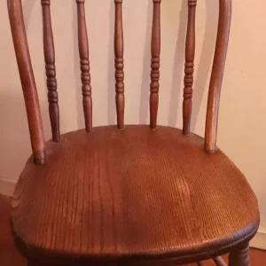 Vintage wooden chair with spindle back