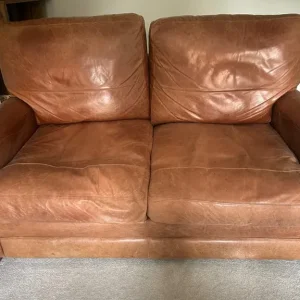 Two natural hide leather sofas, very comfortable