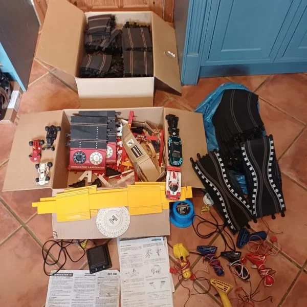 Vintage Scalextric cars and track pieces