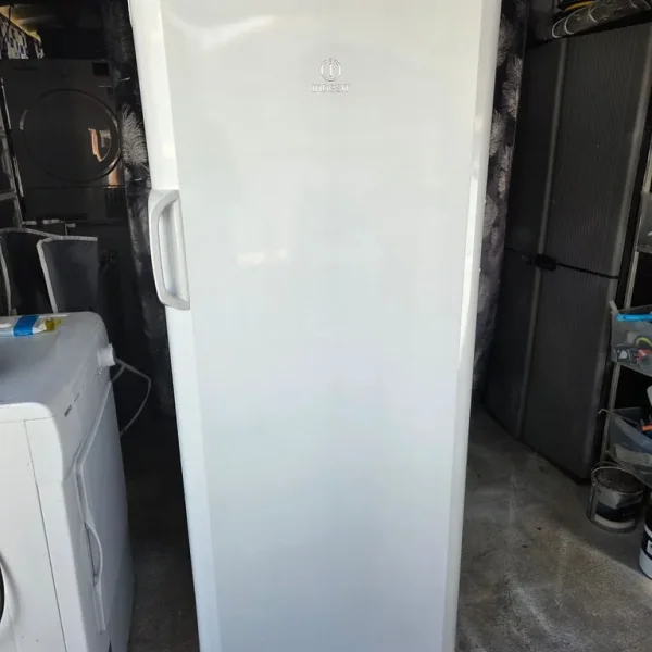 Tall freezer by Indesit