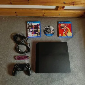 Sony PS4 with Original Controller and 3 Games