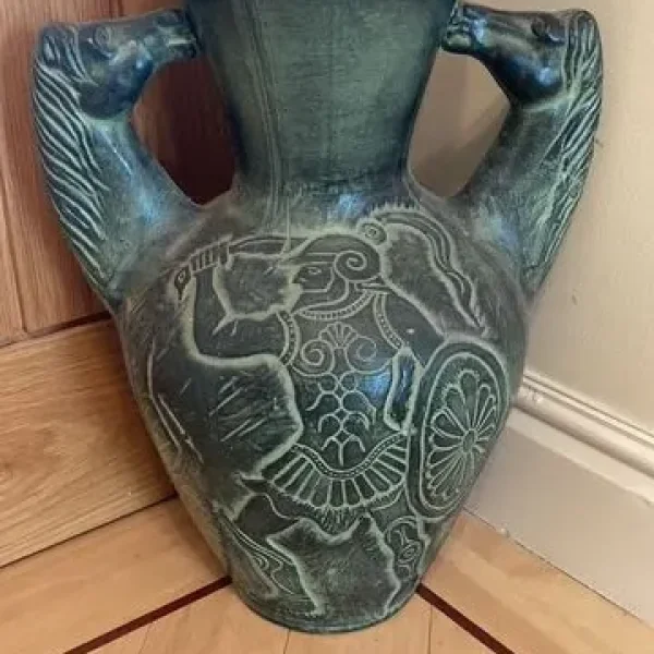 Large green ceramic ornament with horse head handles