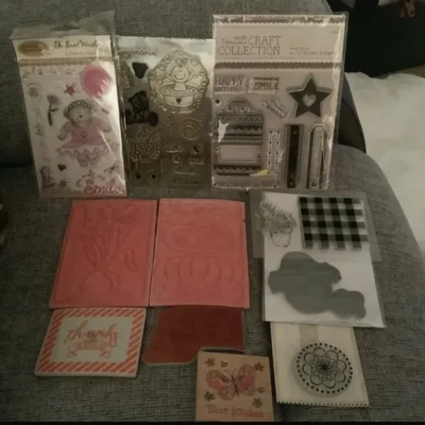 Various bundles of paper craft stamps