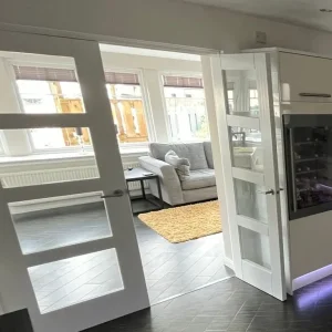 Pair of internal white gloss glass panel french doors with brushed chrome handles - Image 2