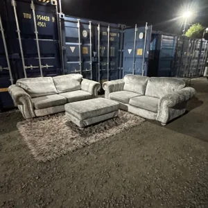 2 x grey/silver crushed velvet 3 seaters and pouffe