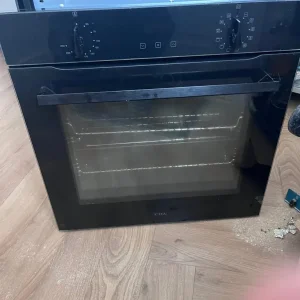 Twelve function electric oven with timer and compact combo microwave