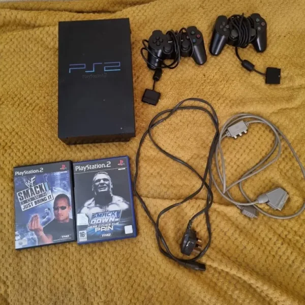 Ps2 with controllers and two games