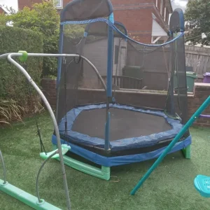 Trampoline with swing attached