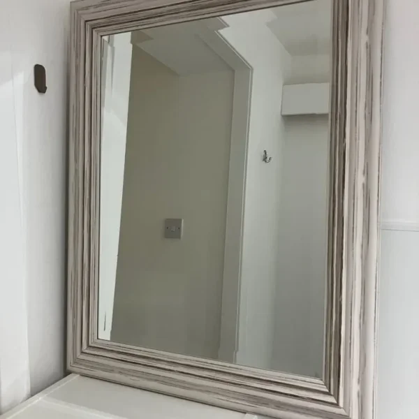 Cream distressed framed mirror