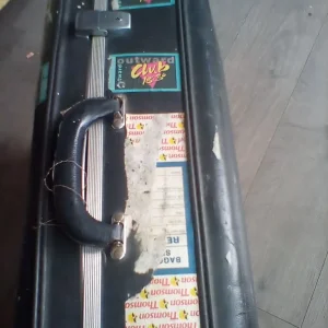 Vintage suitcase with 18 to 30 stickers