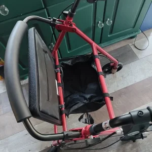 Folding disabled walker with seat and storage bag