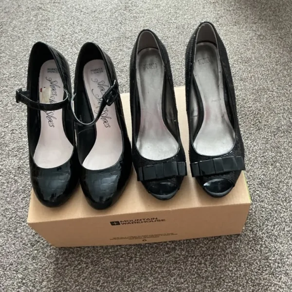 Two pairs of black patent heels