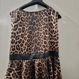 Leopard print peplum top (large) - Image 2