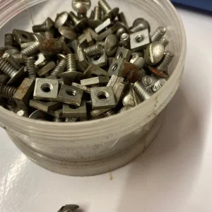 Small tub of screw heads and nuts