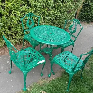 Cast alloy garden table and four chairs