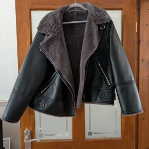 Fluffy lined leather jacket size 16
