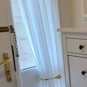 Pair of cream door curtains with gold rails and tie backs - Image 2