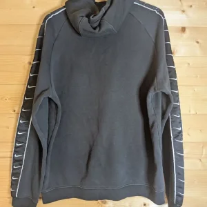 Nike Black Hoodie with Swoosh Logo Tape, Men's Size Large - Image 2