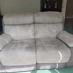 2 matching grey reclining sofas