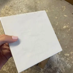 Rustic white square tiles