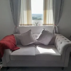 2 seater grey velvet sofa